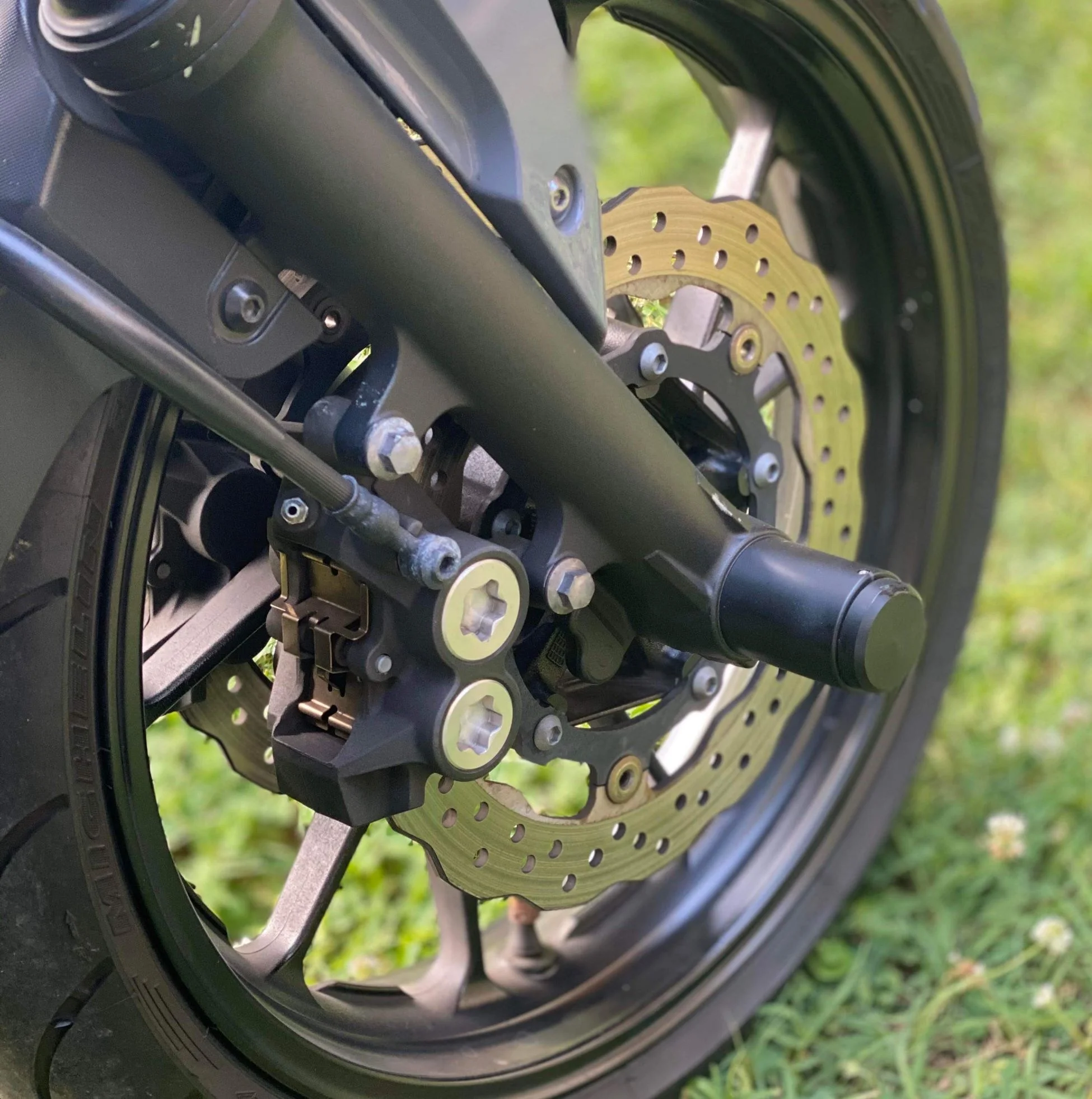 Axle pegs on front of Yamaha MT07 or FZ07 from Outlaw Stunt Parts